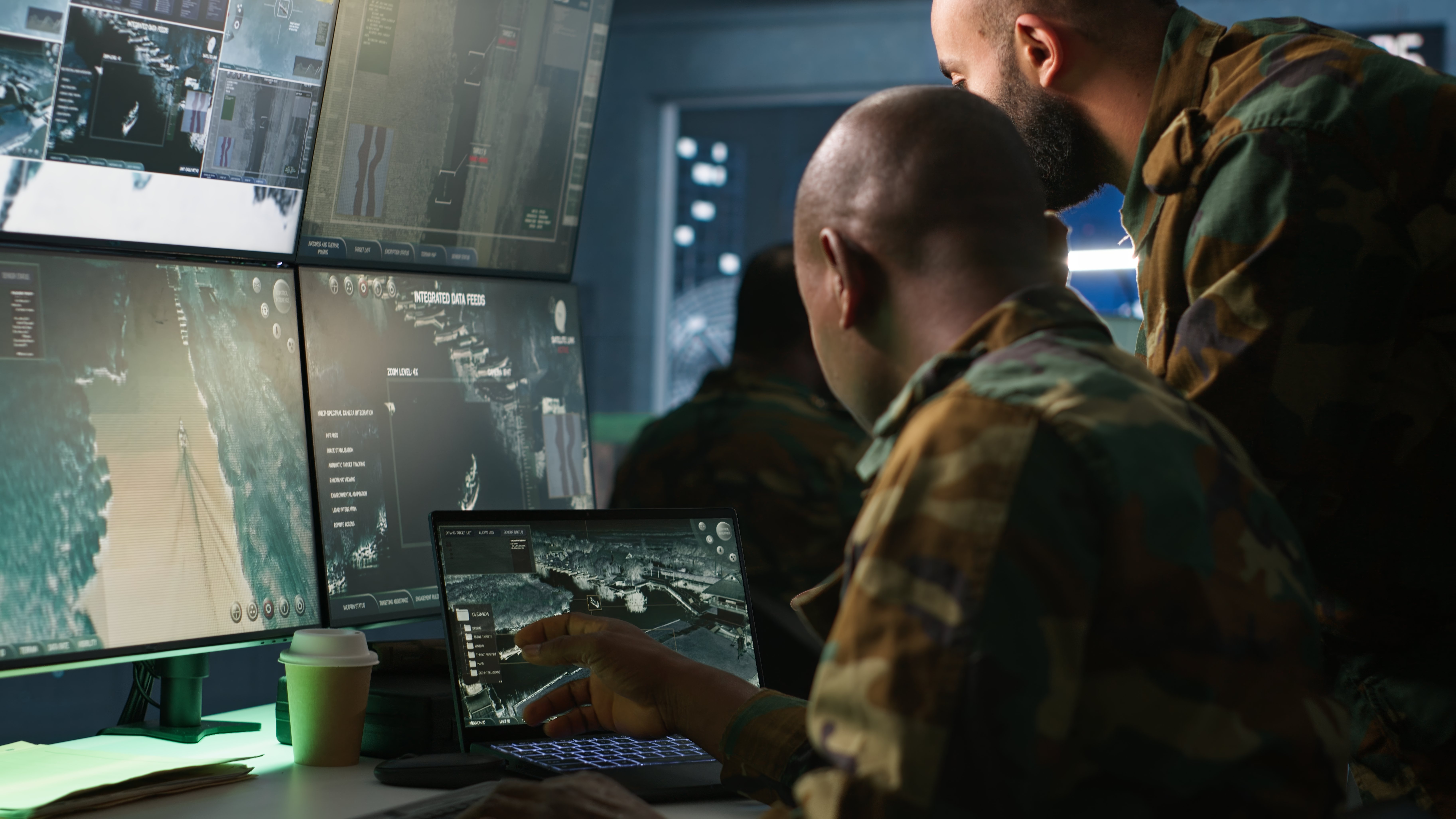 team-army-specialists-examining-data-monitoring-room